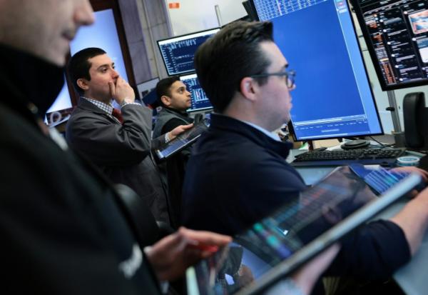 Traders sur le parquet du New York Stock Exchange le 1er mai 2026 à New York.