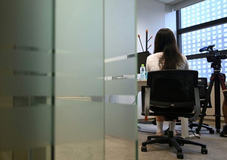 Mme Yoo, identifiée uniquement par son nom de famille et qui a lancé une procédure pour harcèlement au travail, lors d'un entretien à l'AFP le 15 août 2026 à Séoul