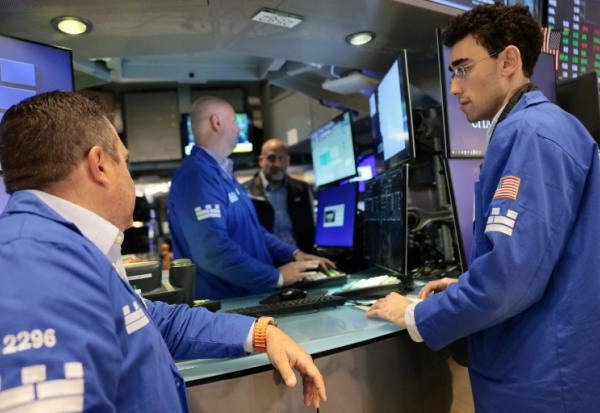 Traders sur le New York Stock Exchange le 14 septembre 2026.