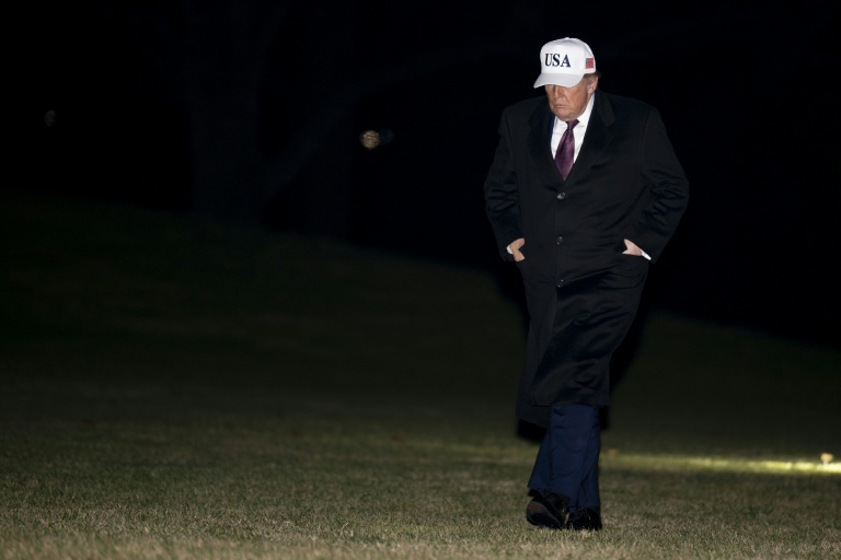 Le président américain Donald Trump à son arrivée à la Maison Blanche à Washington, le 11 janvier 2026, après avoir passé le week-end dans sa résidence de Mar-a-Lago, en Floride 