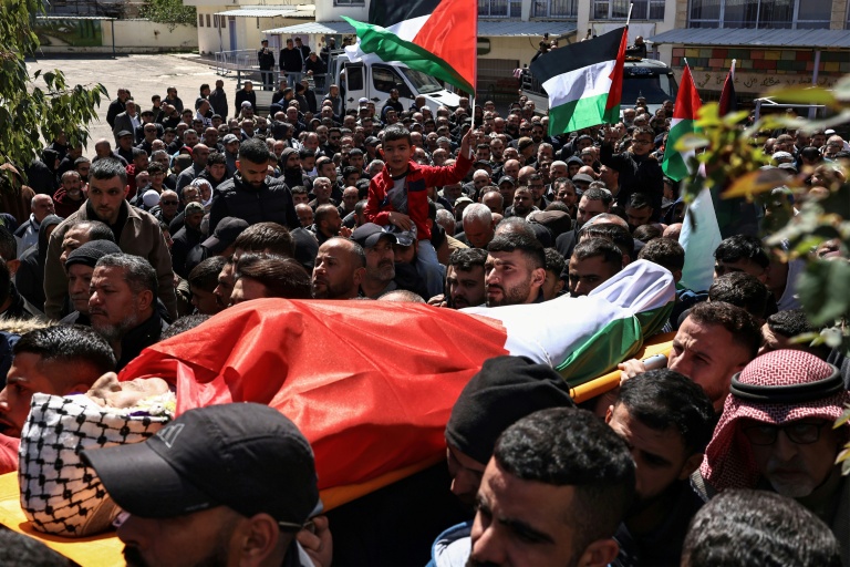 Funérailles de trois Palestiniens tués dans une attaque de colons israéliens, le 12 mars 2026 à Abou Falah, au nord-est de Ramallah