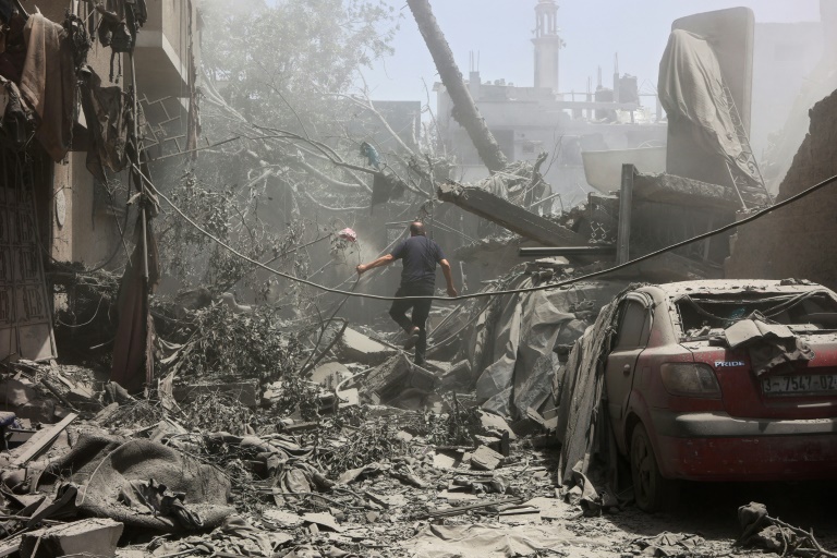 Dans les décombres laissés par les frappes israéliennes dans le quartier al-Tuffah de la ville de Gaza, le 31 mai 2025