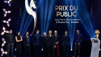 Des membres du studio français Asobo reçoivent le prix Pégase du public pour le jeu vidéo "A Plague Tale: Requiem" lors de la 4e édition des Pégases à Paris, le 9 mars 2023