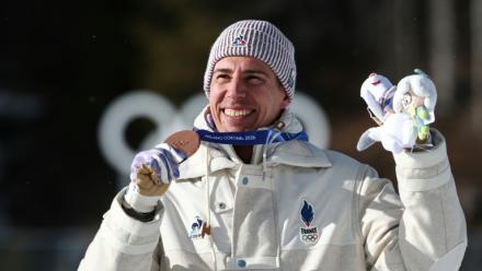 Quentin Fillon Maillet médaillé de bronze de la la mass-start lors des Jeux de Milan Cortina, le 20 février 2026 à Anterselva