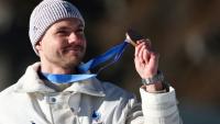Le biathlète français Emilien Jacquelin, médaillé de bronze en poursuite aux JO de Milan Cortina, le 15 février 2026 à Anterselva