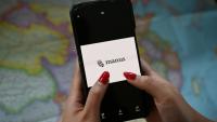 Logo Manus, sur un téléphone mobile, à Pékin le 28 avril 2026.