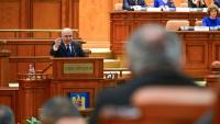 Le Premier ministre roumain sortant Ilie Bolojan au Parlement à Bucarest le 5 mai 2026