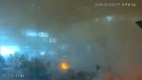 Capture d'écran tirée d'images de vidéosurveillance, diffusée par le ministère saoudien des Médias, le 11 octobre 2026, montrant l'aéroport international de Ryad touché par une frappe houthie, le 10 octobre 2026