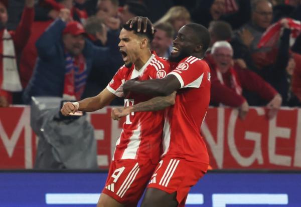 Luis Diaz, auteur du troisième but du Bayern, et Dayot Upamecano exultent face au Real Madrid, le 15 avril 2026 à Munich