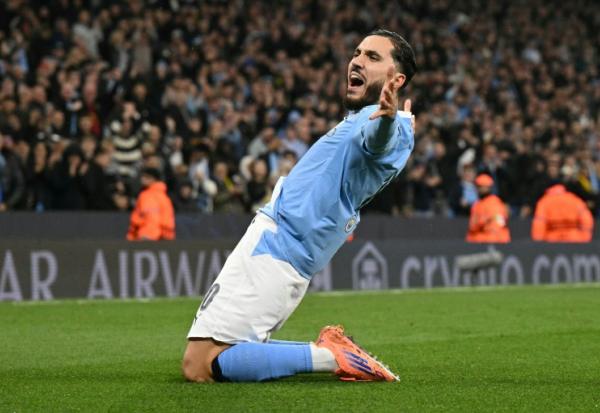 Le milieu Français de Manchester City Rayan Cherki célèbre son but mercredi soir en Ligue des champions, le quatrième de son équipe contre Dortmund.