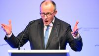 German Chancellor Friedrich Merz delivers a speech at the annual reception of the stock exchange operator Deutsche Boerse in Eschborn, western Germany, on February 2, 2026. 