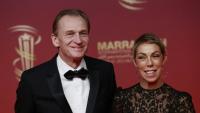 Le producteur Nicolas Altmayer (g) et Mathilde Fvier, directrice des relations publiques de Dior, au festival du film de Marrakech, le 29 novembre 2025 au Maroc