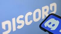Photo d'illustration du logo de la société américaine Discord affiché sur un smartphone et un écran à Rio de Janeiro, au Brésil, le 12 août 2026