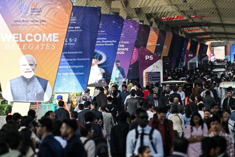 Des visiteurs au Sommet sur l'impact de l'IA, le 17 février 2026 à New Delhi, en Inde