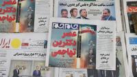 Unes de journaux iraniens consacrées aux négociations avec les Etats-Unis reprises le 6 janvier à Oman, dans un kiosque de Téhéran le 7 février 2026