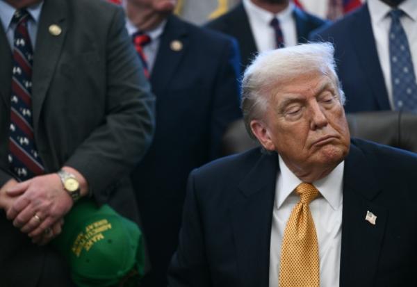 Le président américain Donald Trump s'exprime devant la presse dans le 
Bureau ovale de la Maison Blanche, à Washington, le 14 janvier 2026
