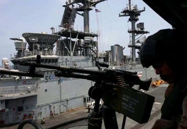 Des soldats américains mettent en oeuvre le blocus des ports iraniens, selon une capture de vidéo diffusée le 25 juillet 2025 par le Commandement pour le Moyen-Orient (Centcom)