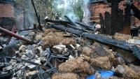 Décombres d'une maison à Chuhuiv dans la région de Kharkiv où la Russie a intensifié son offensive depuis plusieurs jours, le 24 juin 2022