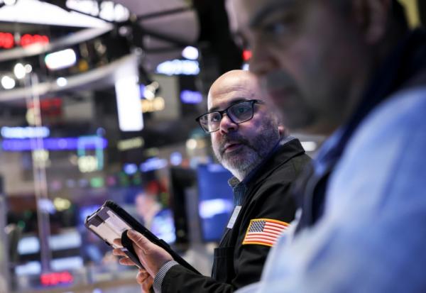 Des opérateurs à la Bourse de New York le 5 mars 2026