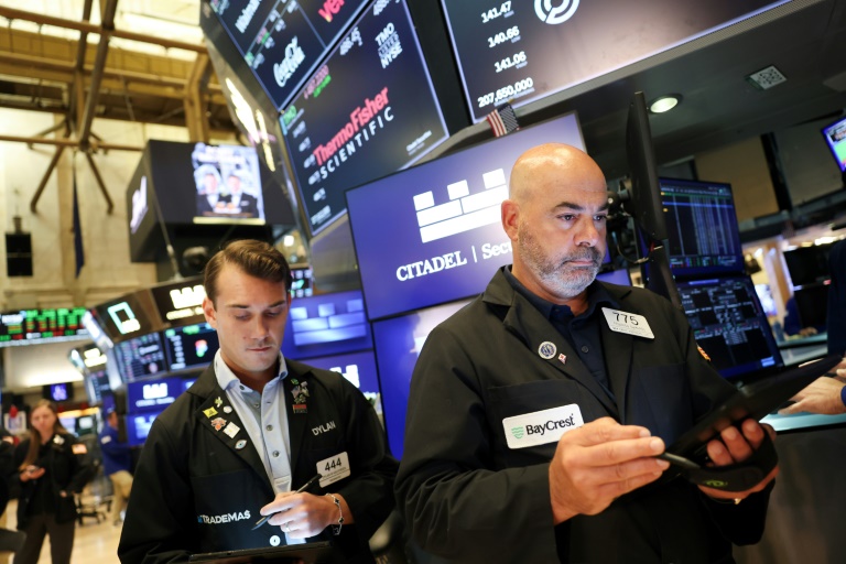 Des opérateurs à la Bourse de New York le 15 août 2025