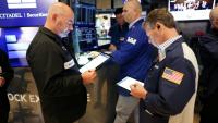 Des opérateurs à la Bourse de New York le 15 août 2025