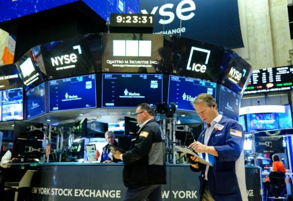 Des opérateurs à la Bourse de New York, le 16 décembre 2025