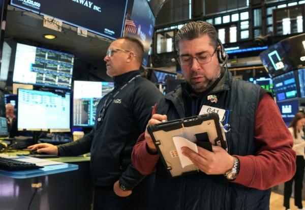 Des opérateurs à la Bourse de New York, le 25 février 2026
