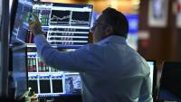Un opérateur à la Bourse de New York, le 12 mai 2025.