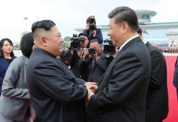 Kim Jong Un et Xi Jinping à Pyongyang, le 21 juin 2019